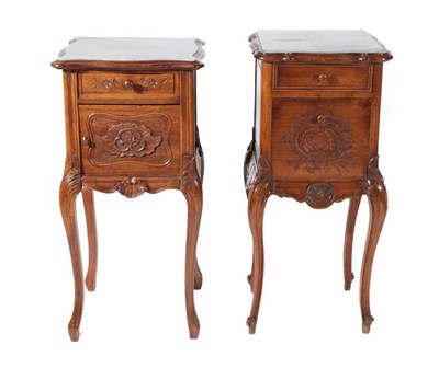 Lot 517 - ~ A Late 19th Century French Walnut Bedside Cupboard, the serpentine shaped top with later...