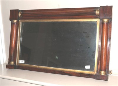 Lot 529 - ~ An Early Victorian Rosewood and Parcel Gilt Mirror, circa 1840, the rectangular mirror plate...