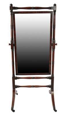 Lot 540 - A Mahogany Cheval Mirror, circa 1820/30, with original mirror plate pivoting on a turned frame with