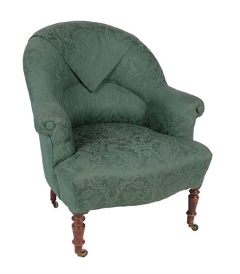 Lot 553 - ^ A Victorian Tub Shaped Armchair, 3rd quarter 19th century, recovered in green floral fabric, with