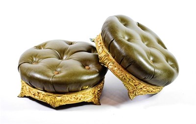 Lot 563 - A Pair of Victorian Rococo Revival Gilt Bronze and Green Leather Footstools, mid 19th century, each