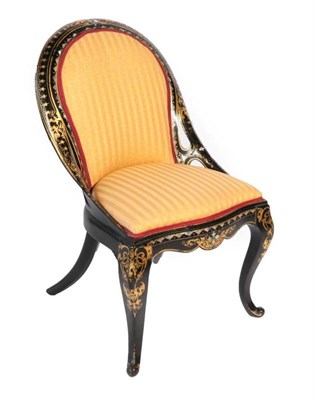 Lot 564 - ^ A Victorian Ebonised, Parcel Gilt and Mother-of-Pearl Inlaid Nursing Chair, late 19th...