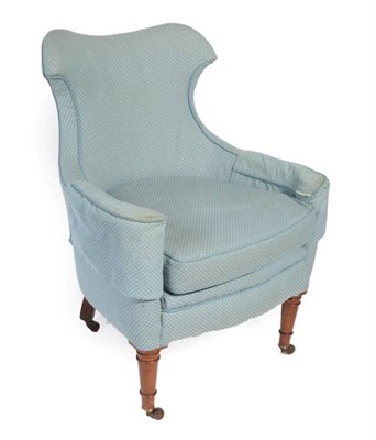 Lot 565 - ^ An Early 19th Century Armchair, recovered in blue and cream spotted fabric, the outswept arms...