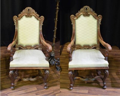 Lot 567 - A Pair of Late 19th Century Carved Oak Armchairs, recovered in green fabric, the acanthus...