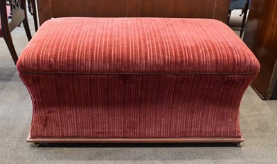 Lot 569 - ~ A Victorian Style Ottoman, labelled Websters Interiors, modern, covered in orange plush...