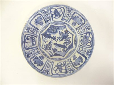 Lot 298 - A Chinese "Kraak" Porcelain Plate, circa 1620, decorated with a central panel of a bird perched...