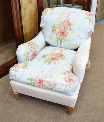 Lot 585 - A Howard & Sons Upholstered Bridgewater Armchair, labelled Howard Chairs Ltd, Makers of Chairs...