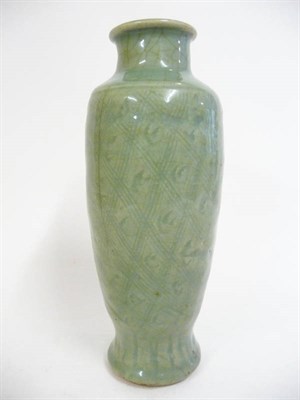 Lot 303 - A Chinese Longquan Celadon Vase, Ming Dynasty, of slender baluster form with sloping shoulders,...