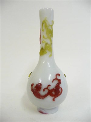 Lot 304 - A "Pekin" Three-Colour Overlay Cameo Vase, circa 1900-1920, of shaft and globe form, the white body