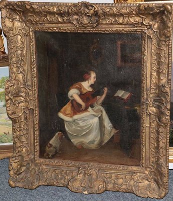 Lot 1130 - After Gerard Ter Borch (1617-1681) Dutch Woman seated at a desk playing a lute Oil on canvas,...