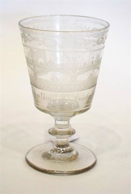 Lot 1175 - A Glass Rummer, circa 1820, the bucket shaped bowl engraved with a view of Southwark Bridge and...