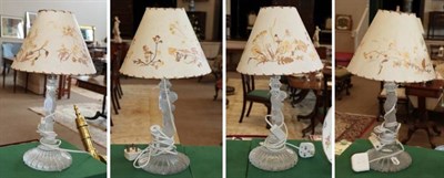 Lot 1177 - {} A Pair of Baccarat Style Moulded Glass Lamp Bases, 20th century, the stems modelled as classical