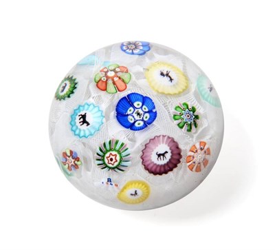 Lot 1178 - A Baccarat Small Spaced Millefiori Paperweight, dated 1848, the thirteen canes including...