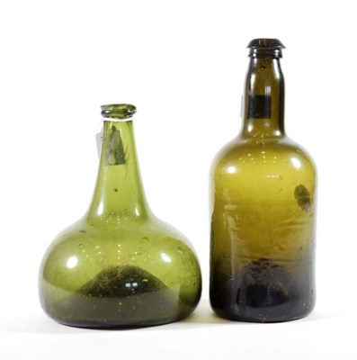 Lot 1183 - A Green Glass Onion Shape Decanter, circa 1700, 20cm high; and A Green Glass Cylindrical Wine...