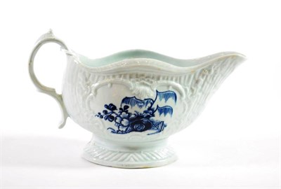 Lot 1206 - A Christian's Liverpool Porcelain Sauceboat, circa 1770, of fluted and foliate moulded form,...