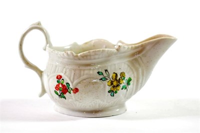 Lot 1207 - A Christian's Liverpool Porcelain Cream Boat, circa 1770, of fluted lobed oval form, painted in...