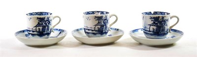 Lot 1212 - A Set of Three Lowestoft Porcelain Coffee Cups, circa 1770, painted in underglaze blue with a...