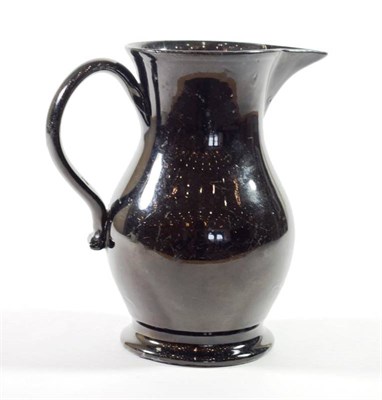 Lot 1216 - A Jackfield Type Black Glazed Pottery Water Jug, circa 1750, 17cm high