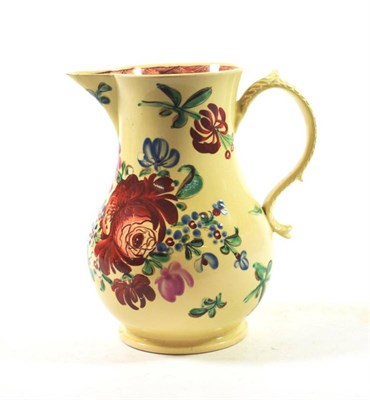 Lot 1222 - A Creamware Jug, circa 1770, of baluster form with scroll handle, painted in colours with...