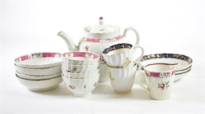 Lot 1223 - A Pearlware Tea Service, circa 1790, of wrythen form, painted in New Hall style with flower...