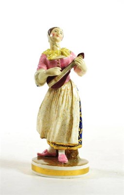 Lot 1226 - A Derby Porcelain Figure of a Musician, circa 1830, after a Meissen original, the standing girl...