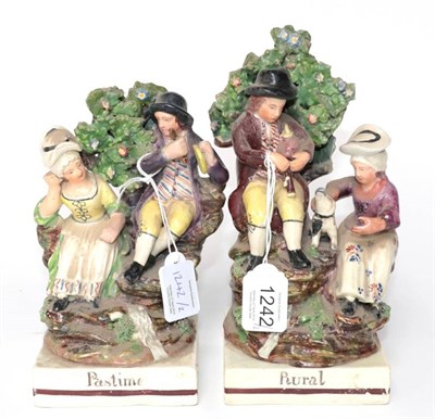 Lot 1242 - A Pair of Staffordshire Pearlware Rural Pastime Groups, circa 1820, each as a couple sitting on...