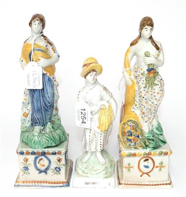 Lot 1254 - A Matched Pair of Pratt Type Pearlware Figures of Classical Maidens, circa 1800, as Spring and...