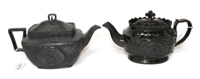 Lot 1278 - A Black Basalt Nelson Commemorative Teapot and Cover, early 19th century, moulded with shell...