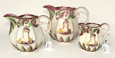 Lot 1283 - A Graduated Set of Three Pearlware Princess Charlotte Commemorative Jugs, circa 1817, moulded...