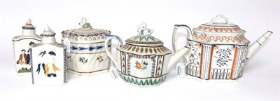 Lot 1297 - A Pratt Type Pottery Commode Shaped Teapot and Cover, circa 1800, moulded and painted with...