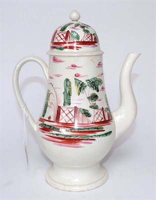 Lot 1304 - A Creamware Coffee Pot and Cover, circa 1770, of baluster form painted in red, green, yellow...