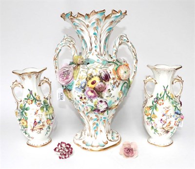 Lot 1308 - ~ A Victorian Staffordshire Porcelain Flower Encrusted Baluster Vase, 39cm; and A Similar Pair...