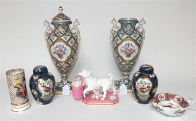 Lot 1309 - ~ A Victorian Brownfields Parian Figure of a Dog, carrying a pink basket; A Modern Spode Spill...