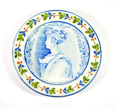 Lot 1318 - A Pearlware Queen Caroline Commemorative Nursery Plate, circa 1821, painted in underglaze blue with