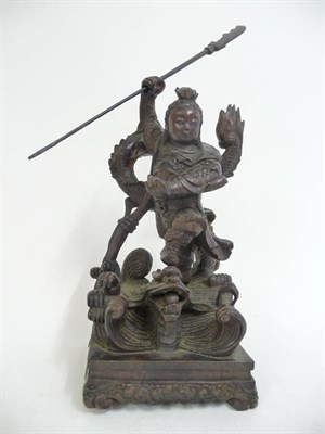 Lot 331 - A Japanese Carved Wood Figure of a Warrior, Meiji Period (1868-1912), standing holding a spear...