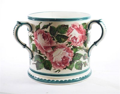 Lot 1334 - A Wemyss Pottery Tyg, circa 1900, of cylindrical form, typically painted with pink roses within...