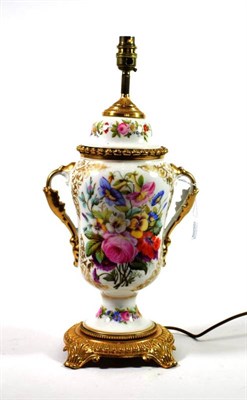 Lot 1342 - ~ A French Porcelain Twin-Handled Lamp Base, circa 1870, painted with flower sprays, 40cm high