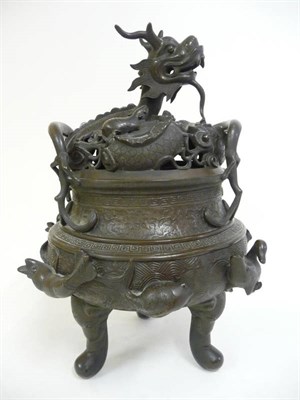 Lot 334 - A Japanese Bronze Koro and Cover, Meiji Period (18168-1912), the pierced cover formed as a...