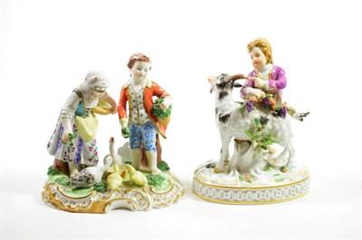 Lot 1366 - A Meissen Porcelain Figure of a Boy and Goat, 20th century, the boy holding fruiting vine on a...