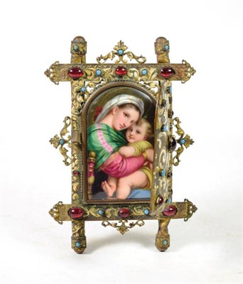 Lot 1367 - A Berlin Style Porcelain Plaque, circa 1880, painted with the Madonna della Seggiola after Raphael