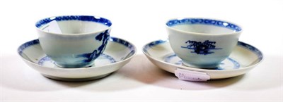 Lot 1377 - A Pair of Chinese Nanking Cargo Tea Bowls and Saucers, circa 1750, painted in underglaze blue...