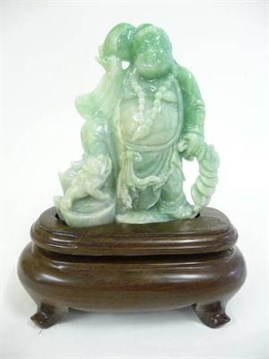 Lot 337 - A Chinese Jade Figure of Liu Hai, late 19th/20th century, the corpulent figure standing holding...