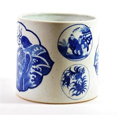 Lot 1386 - A Chinese Porcelain Brush Pot, in Kangxi style, painted in underglaze blue with panels of...