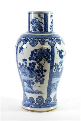 Lot 1390 - A Chinese Porcelain Baluster Vase, Qing Dynasty, painted in underglaze blue with birds and...