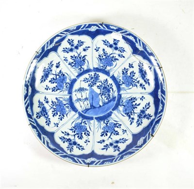 Lot 1392 - A Chinese Porcelain Dish, Kangxi, of circular form, painted in underglaze blue with central...