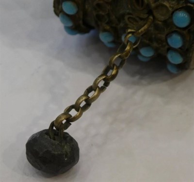 Lot 1417 - A Nepalese Brass Prayer Wheel, with turquoise decoration, 21cm; and A Large Opium Weight, in...