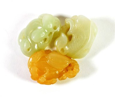 Lot 1435 - A Chinese Jade Carving, of a fruiting branch, 5cm long; and Two Similar Carvings, 4.5cm and 5cm...