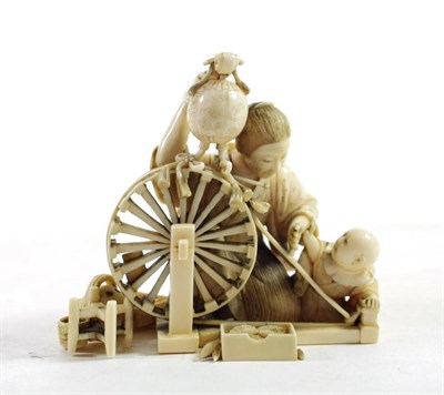 Lot 1444 - A Japanese Ivory Okimono, Meiji period, in the form of a mother and child with a a large...