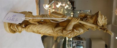 Lot 1458 - A Japanese Ivory Okimono, Meiji period, as an old a man holding a Biwa and plectrum, a dog at...