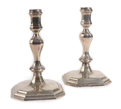 Lot 1491 - {} A Pair of Modern Cast Silver Candlesticks of 18th Century Style, Garrard & Co, London 1972,...